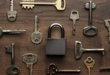 Does Home Depot make keys shown by assorted house keys and a padlock on a wood table