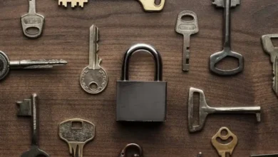 Does Home Depot make keys shown by assorted house keys and a padlock on a wood table