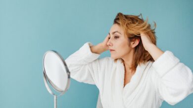 Before-and-after view of brassy blonde hair transformed into a cooler, evenly toned shade using an at-home hair toner.