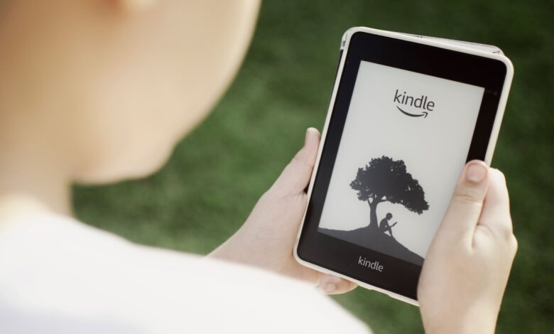 A Kindle e-reader screen showing the Home icon, demonstrating how to return to the Kindle Home Screen with one tap.