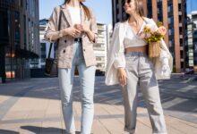 A stylish woman wearing a polished, modern outfit that reflects chic fashion through clean lines, neutral colours, and elegant accessories.