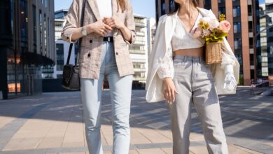 A stylish woman wearing a polished, modern outfit that reflects chic fashion through clean lines, neutral colours, and elegant accessories.